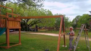 This short video shows construction of this swing set...