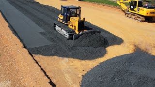 Great Powerful Bulldozer Cutting And Spreading Gravel Building Foundation New Ring Road Of Cambodia