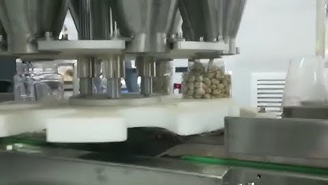Pistachio nuts plastick jar can filling sealing capping machine, nuts packaging machine
