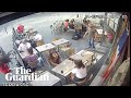 Woman shares footage of assault by street harasser at paris cafe