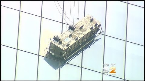 Firefighters Pull Men Dangling From 1 WTC To Safety