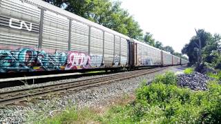 CSX eastbound auto train Q224 with locomotive 518 leading