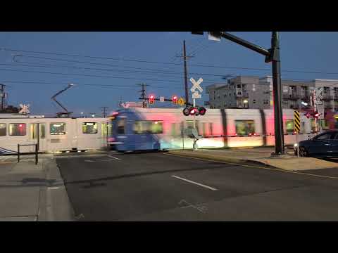 UTA Trax double trains on 2100 South railroad crossing. South Salt Lake, UT