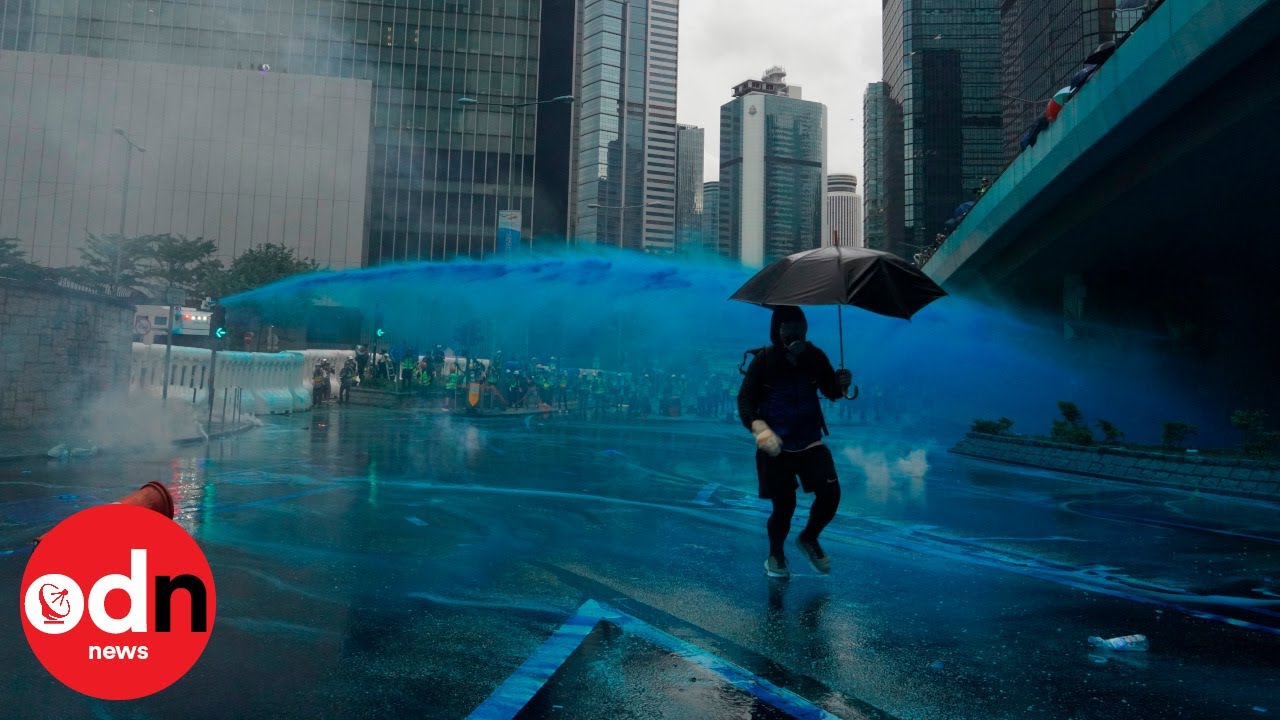 Police in Hong Kong Spray Blue Water on Protesters to Identify Them Later