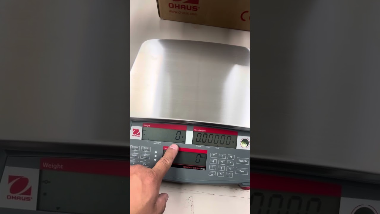 Reprogramming the calibration adjustment unit on a Ohaus Ranger3000/RC31P,