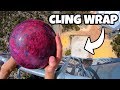 BOWLING BALL Vs. 60 LAYERS of CLING WRAP from 45m!