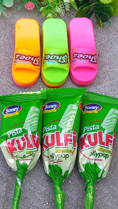Colourful 🎊pista kulfi flavour lollipops🍭 Unboxing with mini slippers gemes 🌈😋#shorts#lolipop#gemes