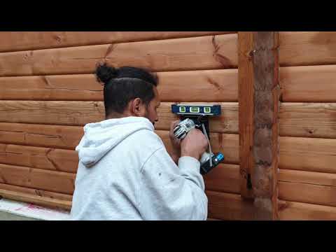 Video: How to install electrical wiring in a wooden house