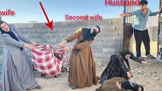 The return of the first wife, his anger because the second wife took over his house.