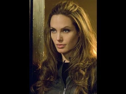 Angelina Jolies Daily Hairstyle Long Casual with Top Layer Pinned Back   Hairstyles Weekly