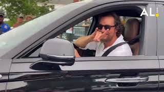 Matthew McConaughey throws horns up to fans during movie shoot in Alabama