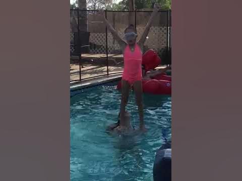 Cheer stunts in the pool - YouTube