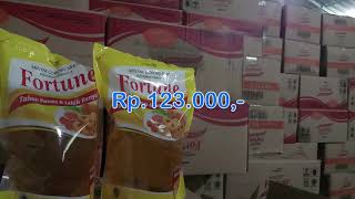 Harga minyak goreng tropical botol 2 liter berapa...???