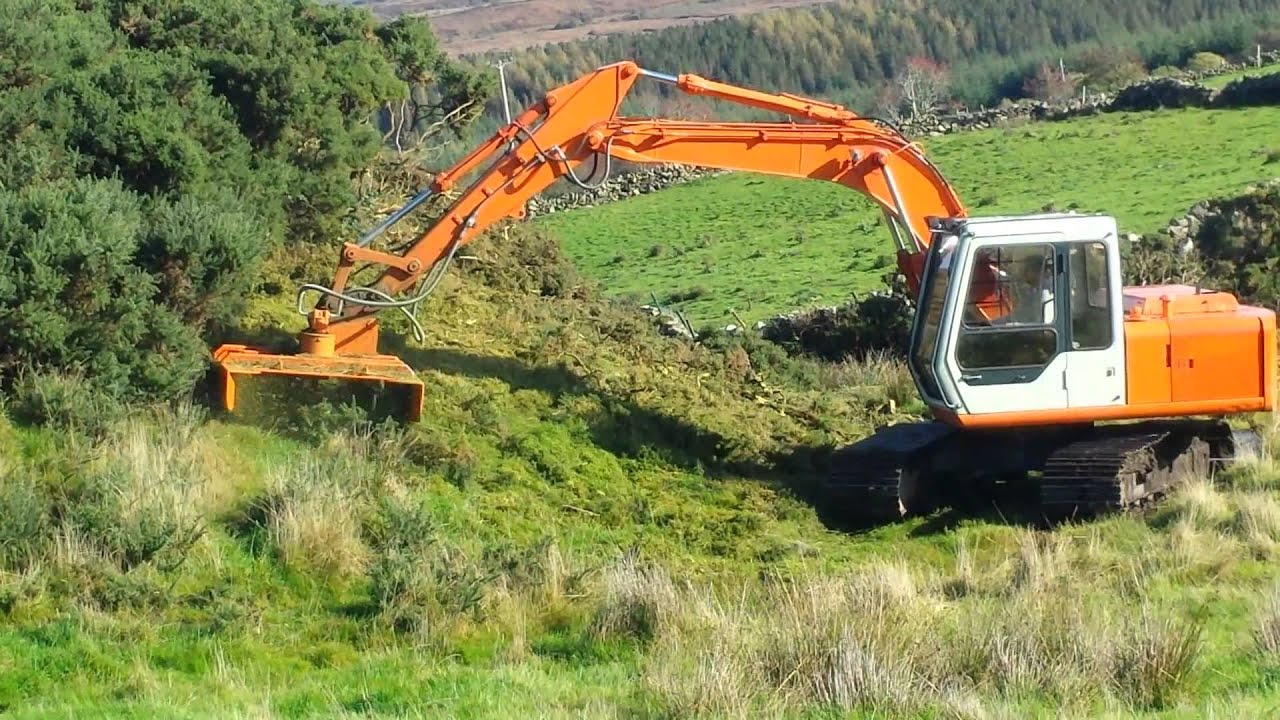 Chain mulcher on ex 100 - YouTube