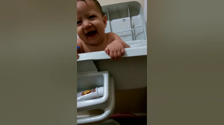Baby laughing in tub