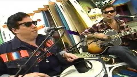 Chris Isaak -    plays  "Somebody