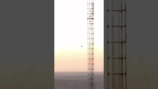 Radio / TV  antenna jump..  #TV #radio #antennas #basejumping #basejumping #tower  #redsky #sunset