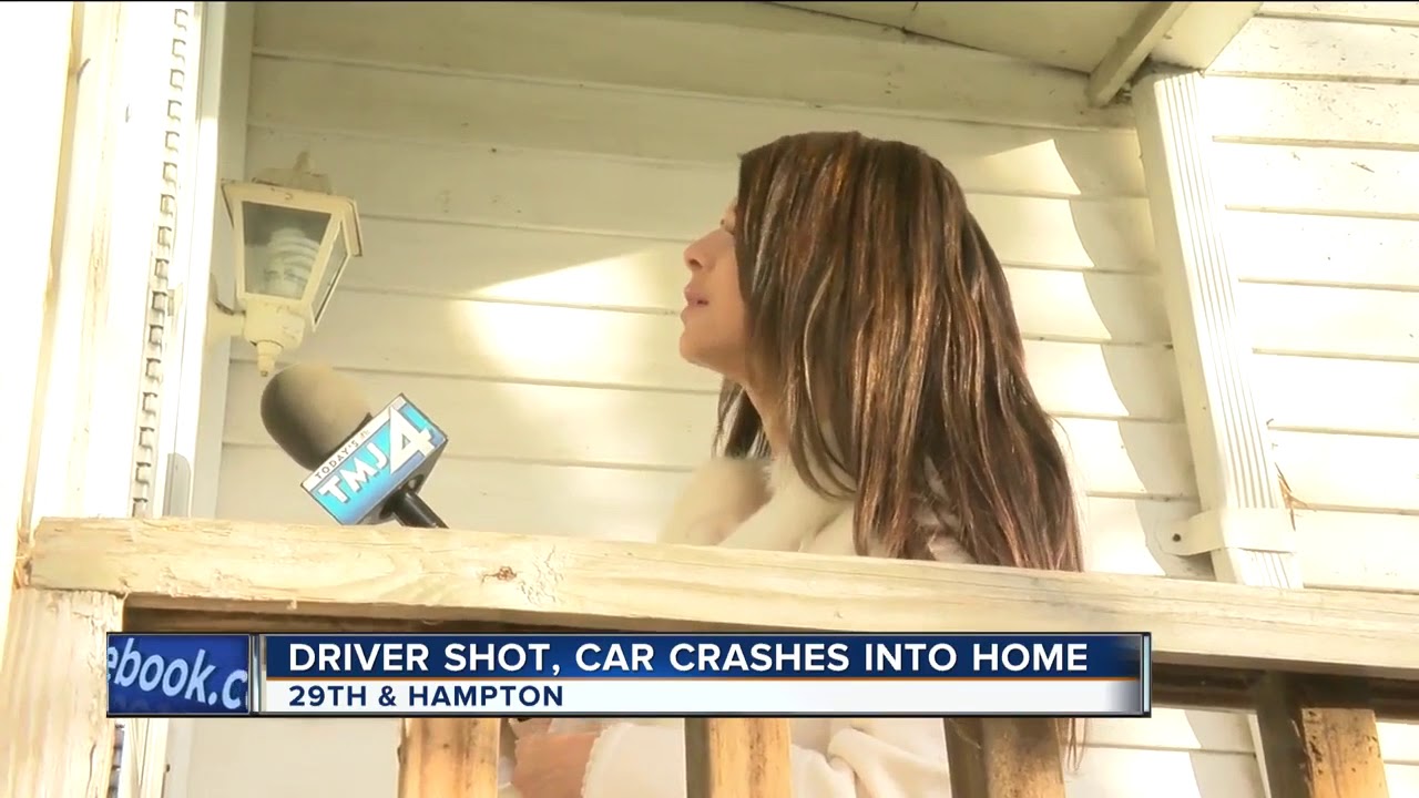 Car crashes into house after driver is shot - YouTube