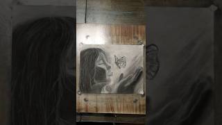 Fluttering Dreams: Charcoal Art of a Girl and a Butterfly