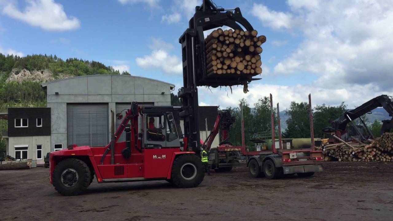 Kalmar forklift truck with a grapple attachment handling timber YouTube