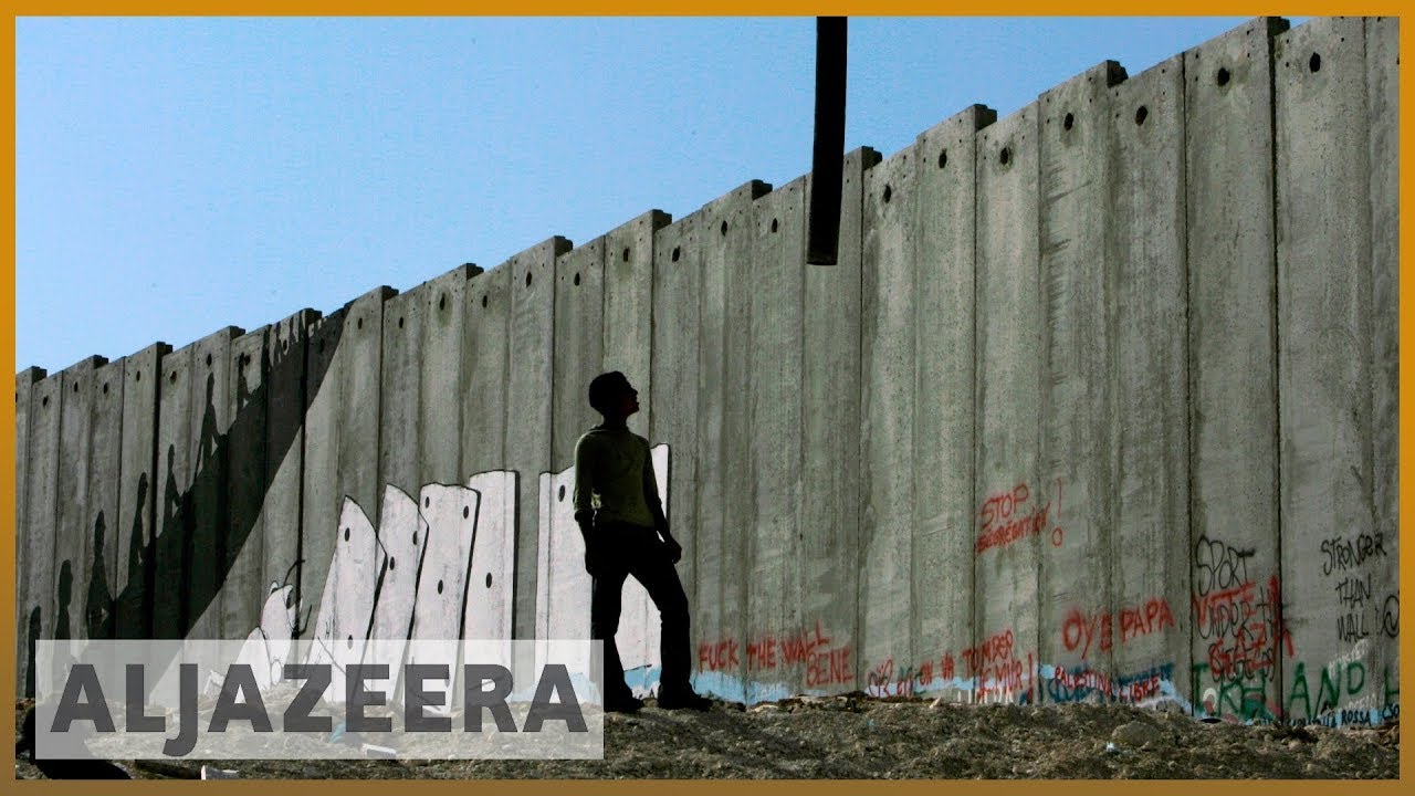 جدار الفصل الإسرائيلي غير القانوني "يسجن" الفلسطينيين