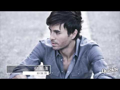 Enrique Iglesias Ft  Justin Bieber   Holding On English Version Official Song