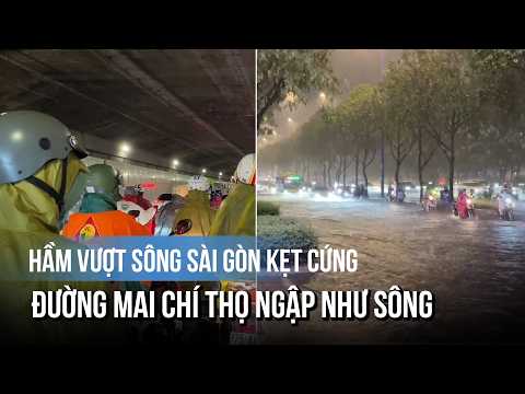 Heavy rush hour rain: Saigon River Tunnel gridlocked, Mai Chi Tho Street flooded like a river
