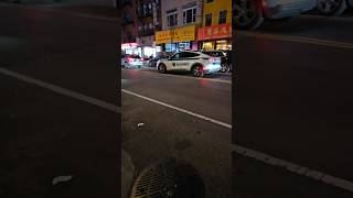 NYC Parks Enforcement Patrol Ford Mach E Passing By On Forsyth Street In Chinatown, Manhattan, NYC