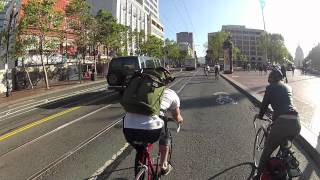 Wind/boxes take out cyclists on Market Street SF HD