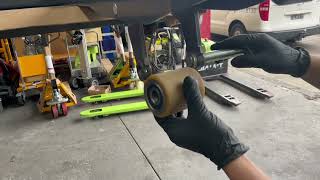 How to change electric pallet jack front wheels