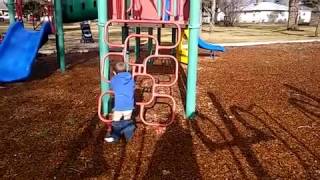 Boy's pants fall down at park