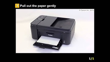 PIXMA MX490: Removing a jammed paper: from the paper output slot
