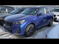 2023 BMW X1 Portimao Blue with Oyster Sensatec