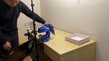 SO-100 robot picks up and puts block in box (GR00T N1)