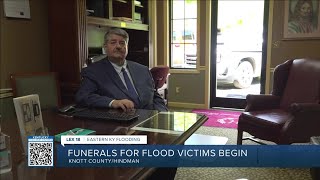 Funerals for flood victims begin