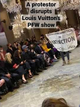 Climate activists storm Louis Vuitton catwalk