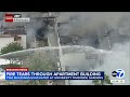 Large fire erupts at Riverside apartment building