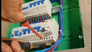 Installing the main and differential breaker on the home’s electrical distribution panel