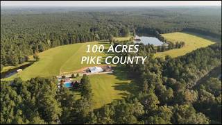 100+- Acres Pike County with a Beautiful Home and Stocked Lake