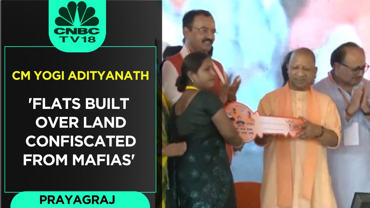 UP CM Yogi Adityanath Hands Over Flats Built On Land Confiscated From ...