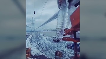 Ice removal from EHT power transmission line