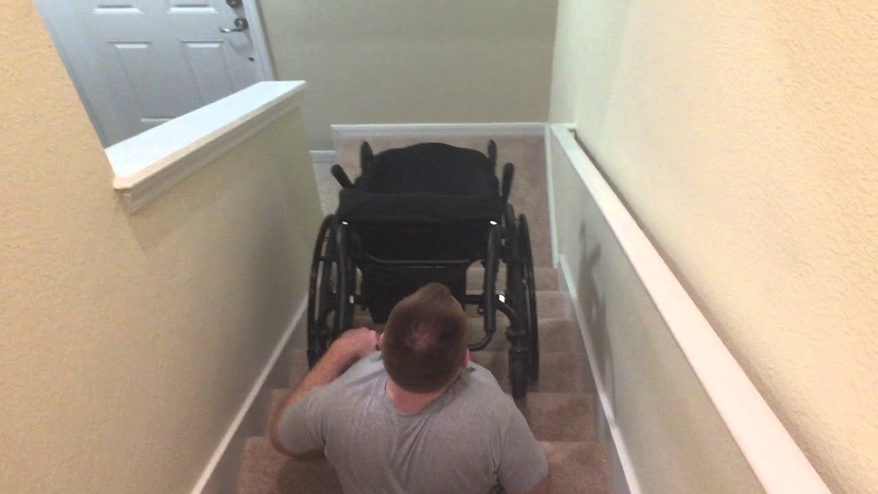 How to bring a wheelchair down a staircase YouTube