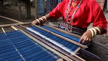Weaving on a backstrap loom with a reed by Kay Faulkner (Flores, Indonesia)