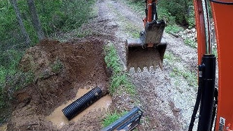 Culvert extension for a gravel driveway (time lapse) (Kubota KX057)