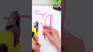 [USEFUL TIP] A SIMPLE PHONE HOLDER MADE FROM A CLOTHES HANGER