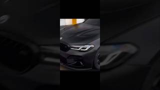 car ev Vs BMW M5 competition of aura