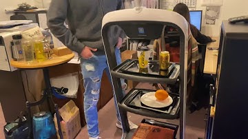 Waitresses Are Happy to Serve robots as waiters Robot First Time in usa