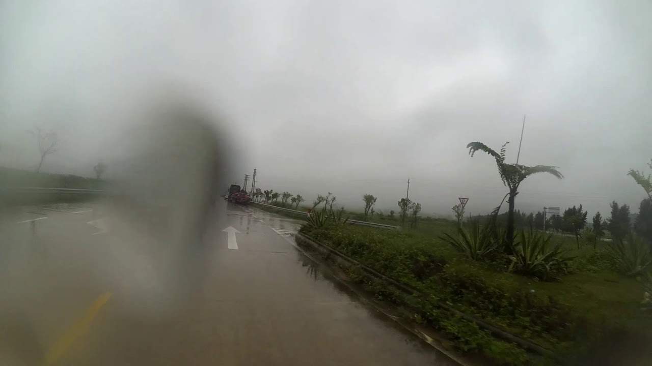 Wet weekend riding in Taishan - YouTube