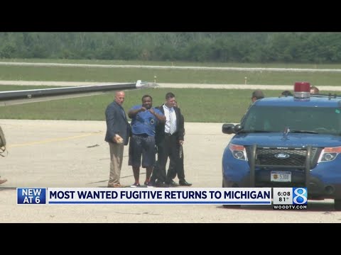 'Most Wanted' fugitive dances returns to MI, dances on tarmac