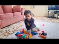 Boy play  on the  garnud with dad